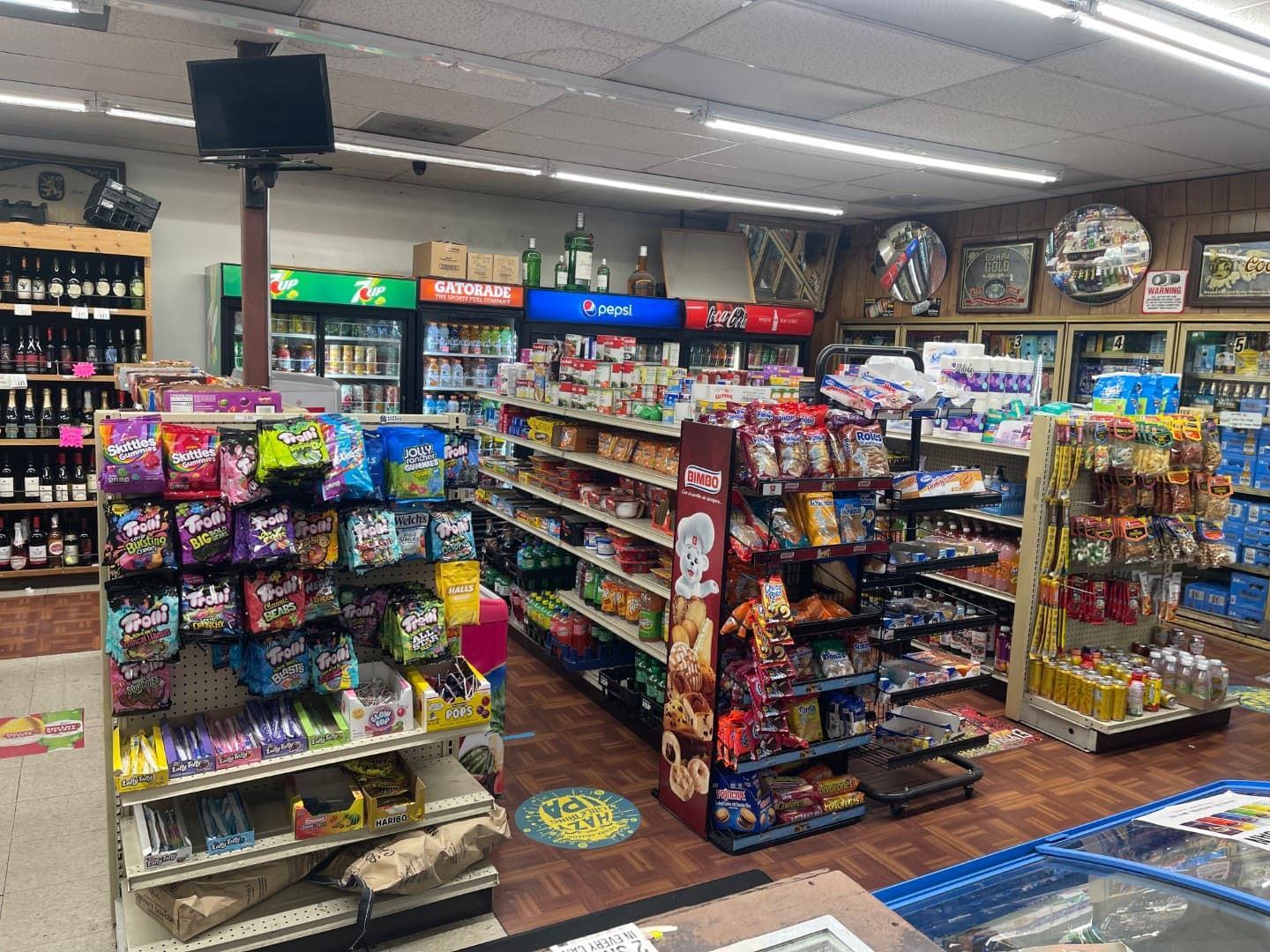 Inside Del Norte Liquors — well-stocked aisles
